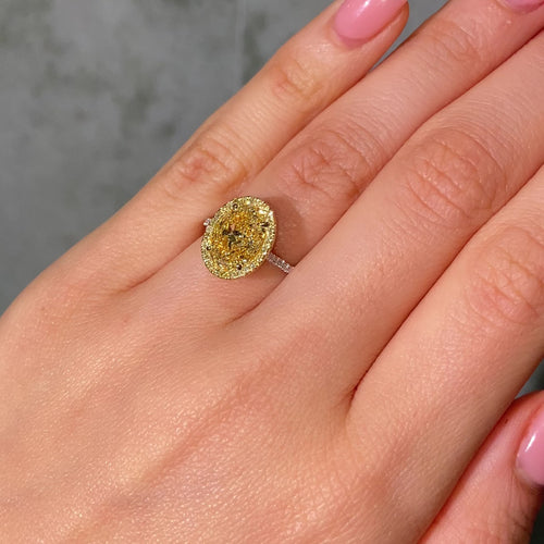 Two Tone Oval Diamond Halo Engagement Ring