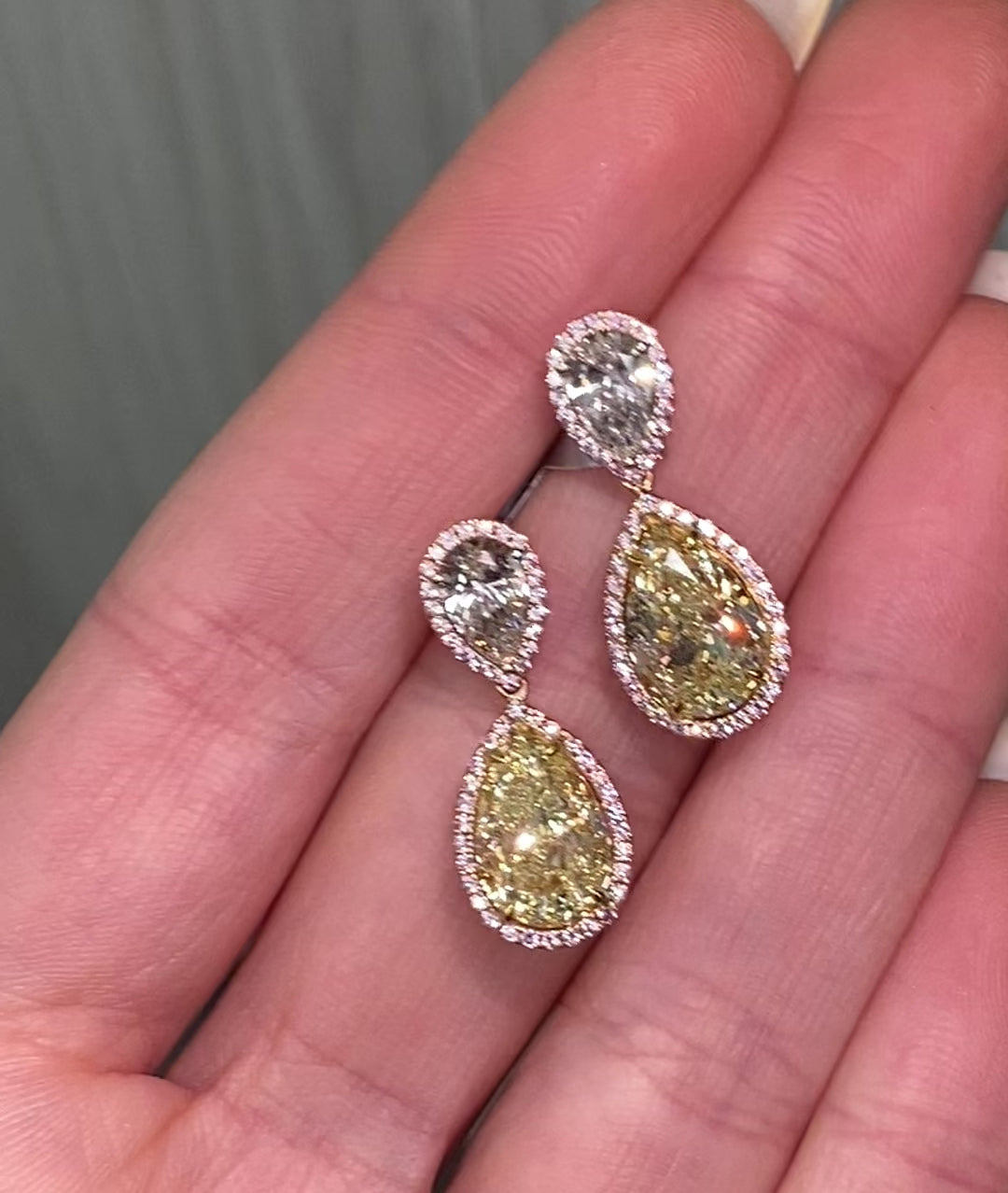 Fancy yellow diamond pear shape earrings.  yellow diamond drop earrings. diamond earrings.