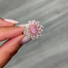 Unique natural light pink elongated cushion cut set in white diamond white gold ring.