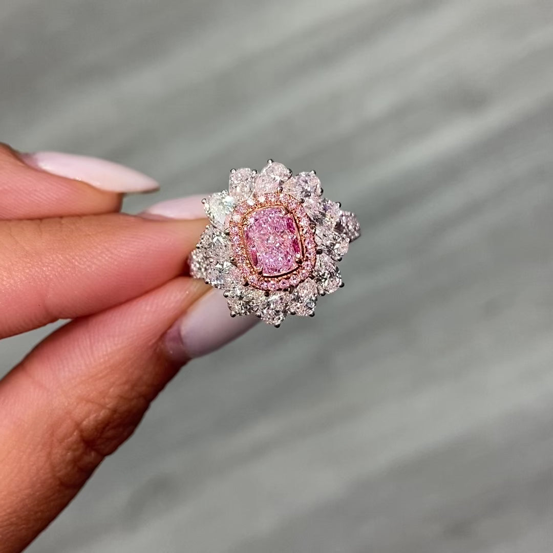 Unique natural light pink elongated cushion cut set in white diamond white gold ring.