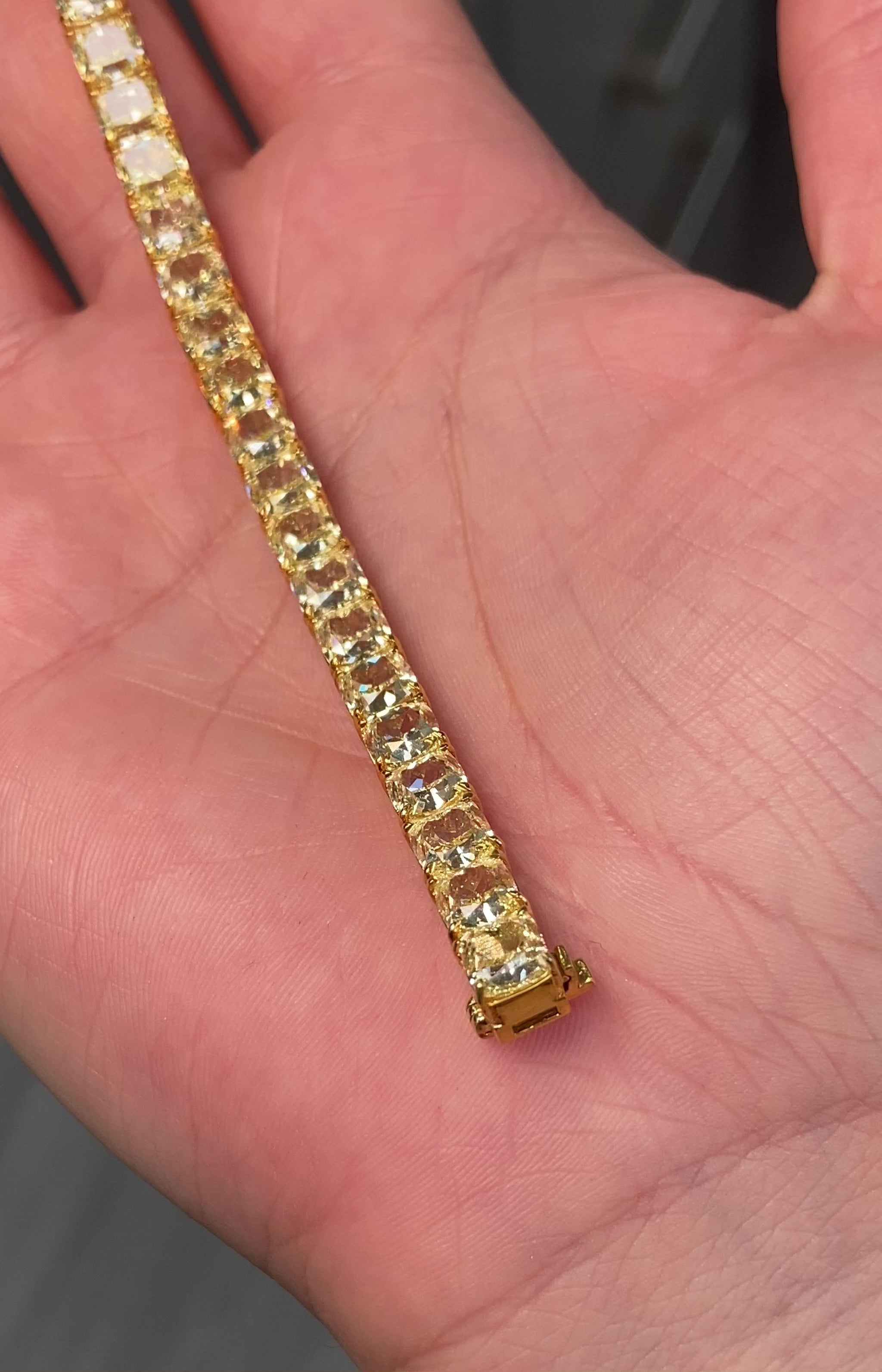 GIA certified fancy yellow cushion cut diamond bracelet featuring VS+ clarity.