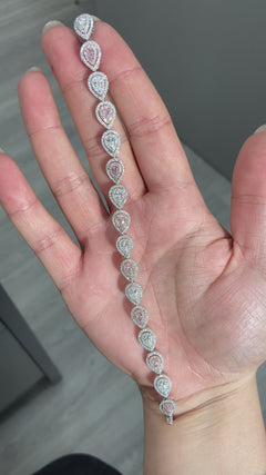 4.68 Carat total weight  Natural Pink and White pear shapes F/G color white diamonds  VS-SI clarity  Set in 18K White Gold  7 inches Exceptional Craftsmanship Handmade in NYC