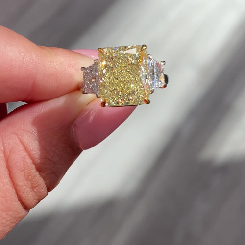 7 carat yellow diamond ring, unique canary diamond engagement ring, elongated radiant diamond, light yellow elongated diamond.