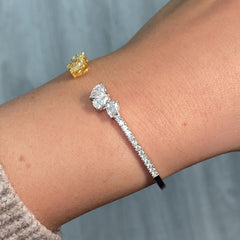 yellow and white diamond bangle with all natural diamonds and pave on the band