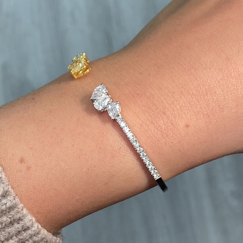 yellow and white diamond bangle with all natural diamonds and pave on the band