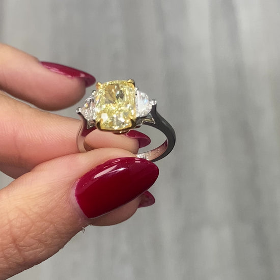 Yellow diamond engagement ring, unique elongated cushion cut diamond three stone ring, canary diamond ring