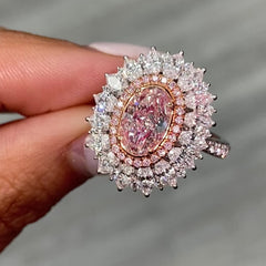 natural light pink elongated cushion cut set in white diamond white gold ring