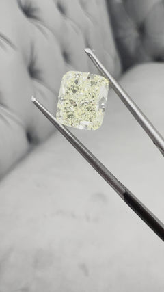 Fancy yellow diamond cushion. Yellow diamond cushion cut. Cushion canary diamond.