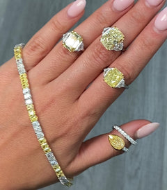 5 Carat Yellow Emerald Cut Diamond Three Stone Ring