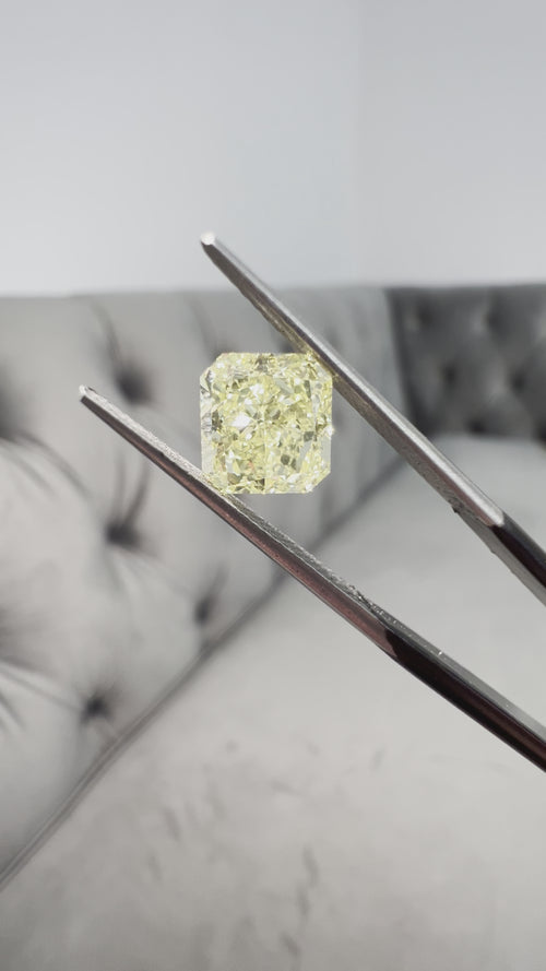 Fancy yellow diamond radiant cut. Yellow diamond square radiant. GIA yellow diamond.