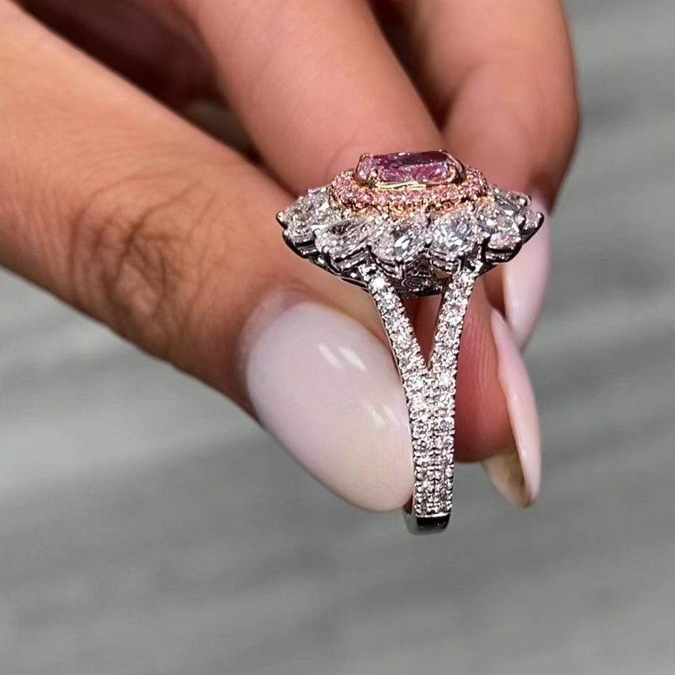 Unique natural light pink elongated cushion cut set in white diamond white gold ring.