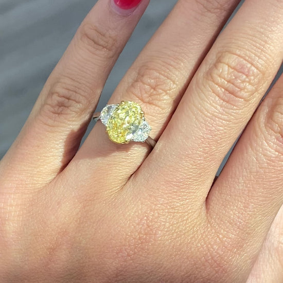 3ct Fancy intense Yellow Oval Three Stone Diamond Ring, a canary oval diamond!