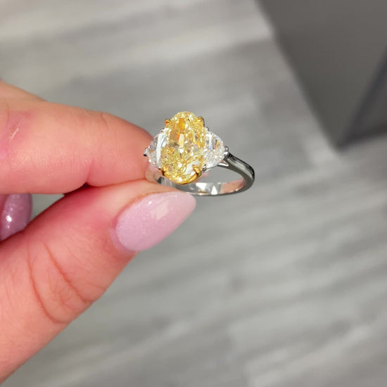3ct Fancy Light Yellow Oval Three Stone Diamond Ring, a canary oval diamond!