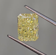 GIA certified natural yellow canary elongated diamond.