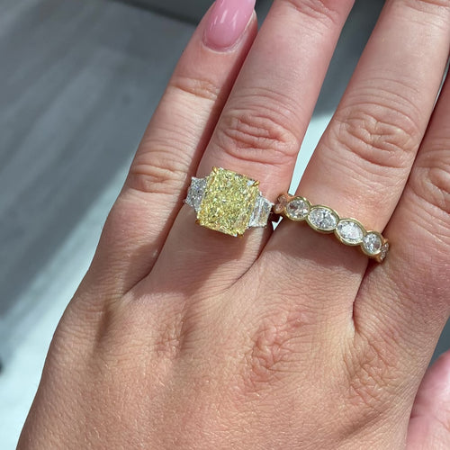 7 carat yellow diamond ring, unique canary diamond engagement ring, elongated radiant diamond, light yellow elongated diamond.