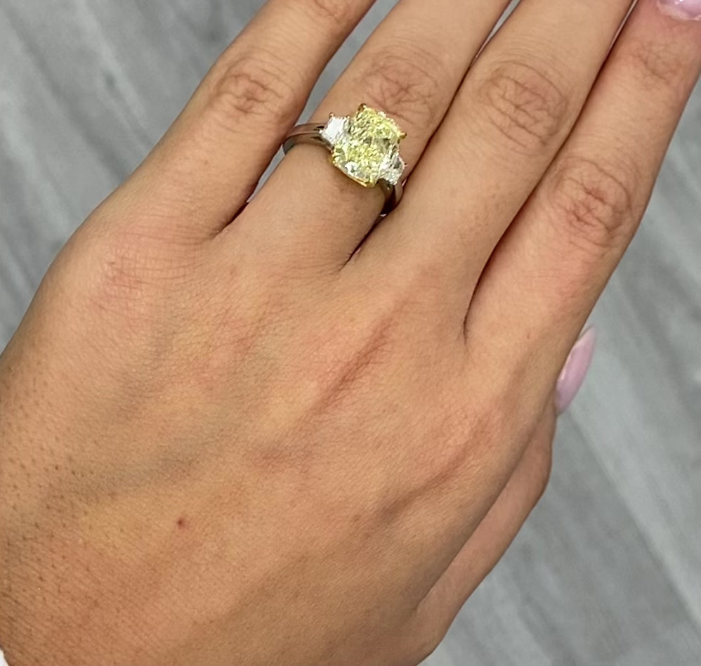 yellow diamond engagement ring with elongated cushion cut diamond
