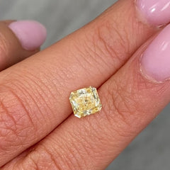 Vivid orange yellow radiant diamond with GIA certification and exceptional VVS1 clarity.