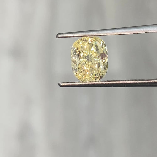 Elonagted ciushion fancy yellow diamond. Long cushion fancy yellow diamond. 