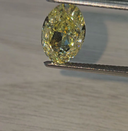 5.08ct Fancy Yellow Flawless Oval Cut Diamond - Loose