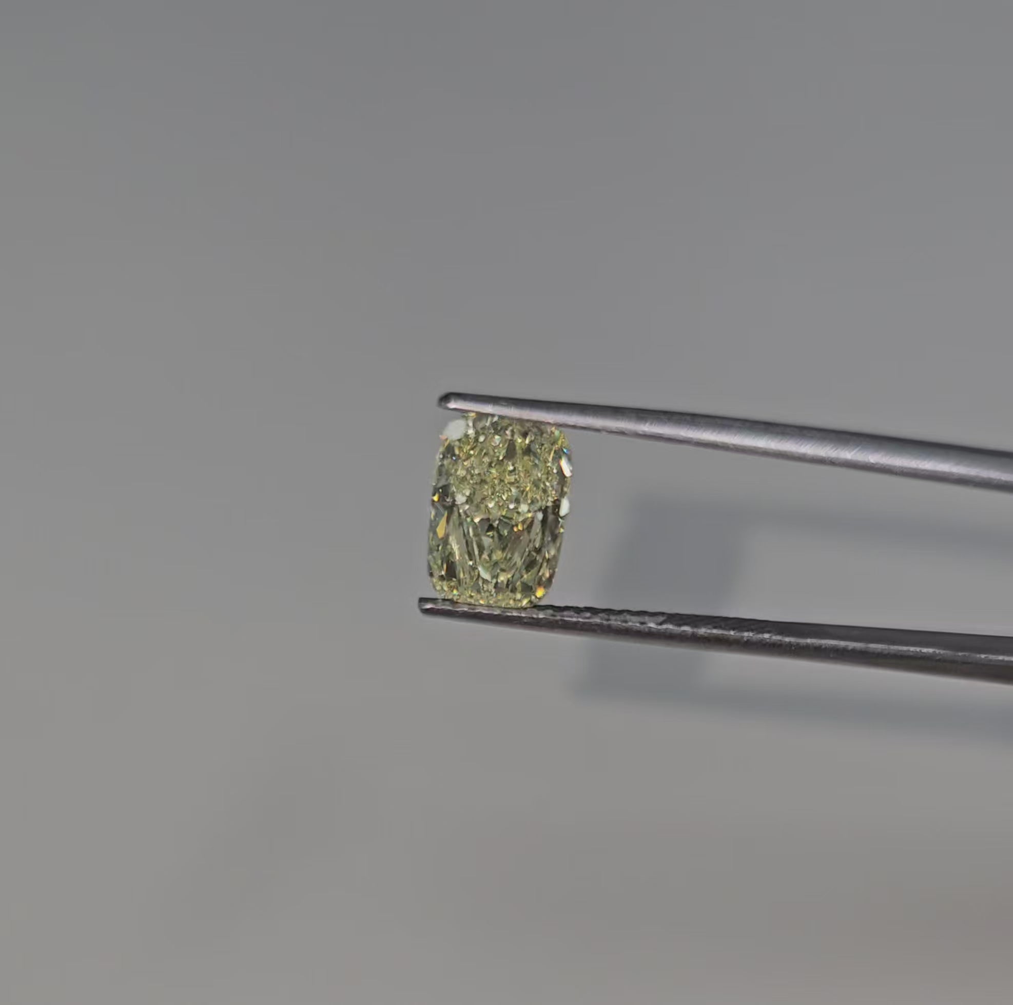 elongated cushion cut diamond, natural light yellow diamond, unique canary diamond