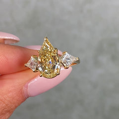 4 Carat Step Cut Pear Shape Champagne Diamond Three Stone Ring