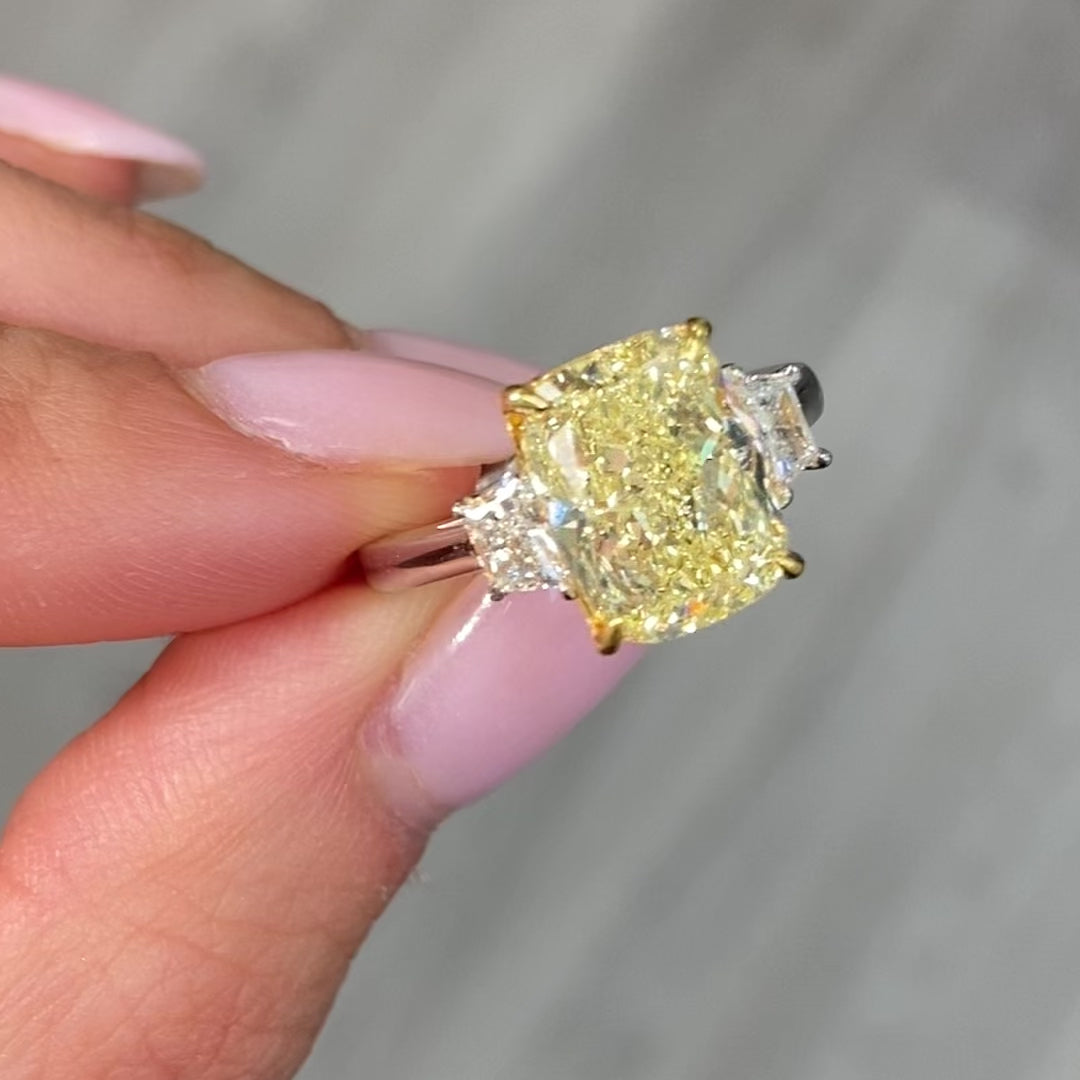 yellow diamond engagement ring with elongated cushion cut diamond