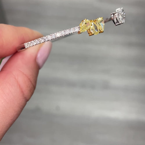 yellow and white diamond bangle with all natural diamonds and pave on the band