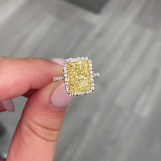 5ct Yellow Elongated Radiant canary diamond Halo Diamond Ring with an elongated radiant cut canary yellow diamond