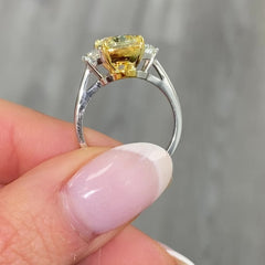 3 Carat Fancy Light Yellow Elongated Cushion Diamond Three Stone Ring