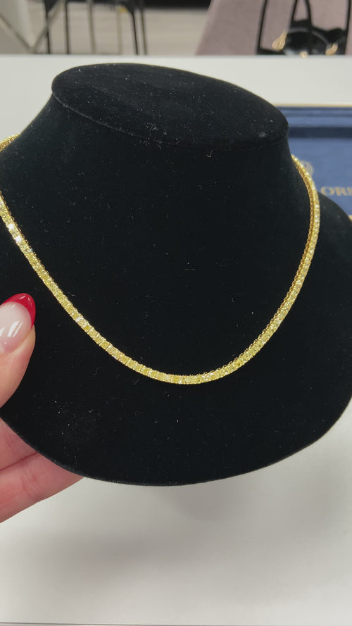 Luxurious tennis necklace featuring natural yellow cushion cut diamonds with VS-VVS clarity.