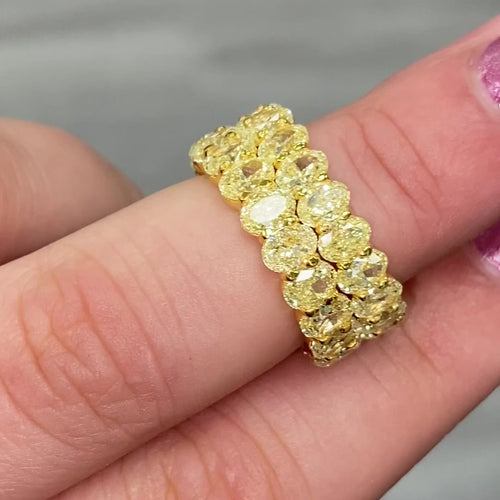 fancy yellow Oval diamond eternity ring. Yellow diamond oval eternity ring. Yellow diamond band. Canary diamond band. Yellow oval diamonds. Fancy yellow oval diamond ring. Yellow diamond stackable rings.