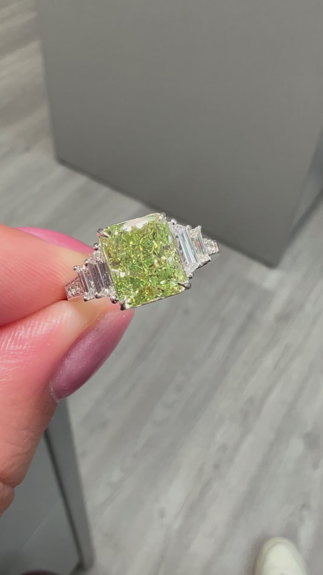 Natural Green elongated radiant diamond ring. GIA green diamond. Natural green diamond. JLO green diamond ring.  Long radiant. Rectangular radiant