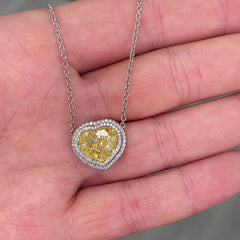 5 carat fancy light yellow heart shape pendant. yellow diamond heart shape pendant