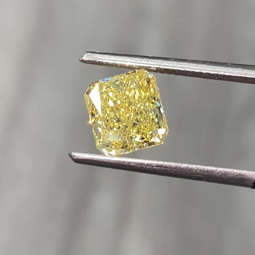 Fancy intense yellow radiant cut diamond with VS1 clarity, excellent cut, GIA certified.