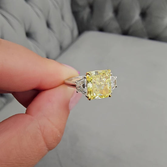 3 carat fancy yellow diamond ring. Yellow radiant cut diamond ring. Yellow engagement ring. Yellow diamond ring. Yellow diamond jewelry. Gia certified