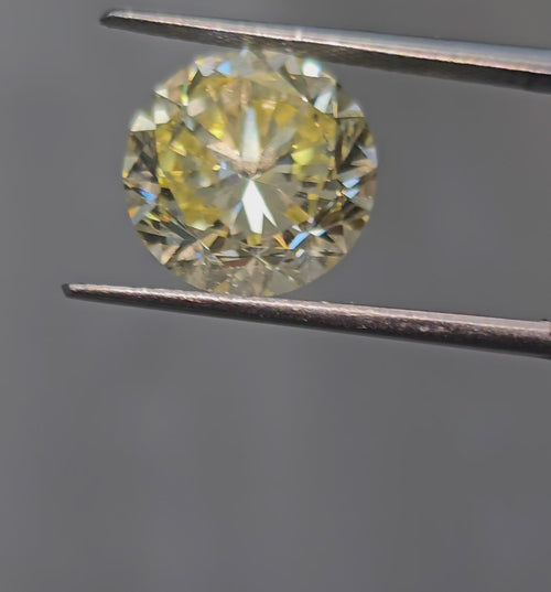 Unique elongated yellow natural handmade diamond.