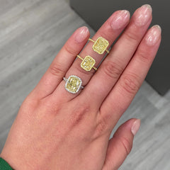 4.73 Carat Center Diamond GIA Light Yellow VS2 Clarity  Cushion Cut Diamond  0.52 Carats of White Rounds  Set in Platinum and 18k Gold  Split Shank band  Handmade in NYC GIA Certified Diamond 