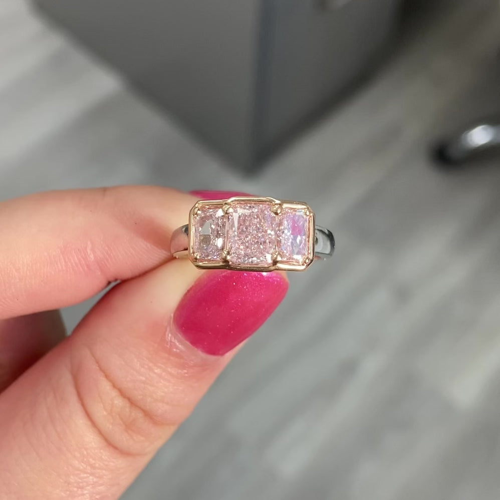 Light Pink Elongated Radiant Cut Diamond Three Stone Ring