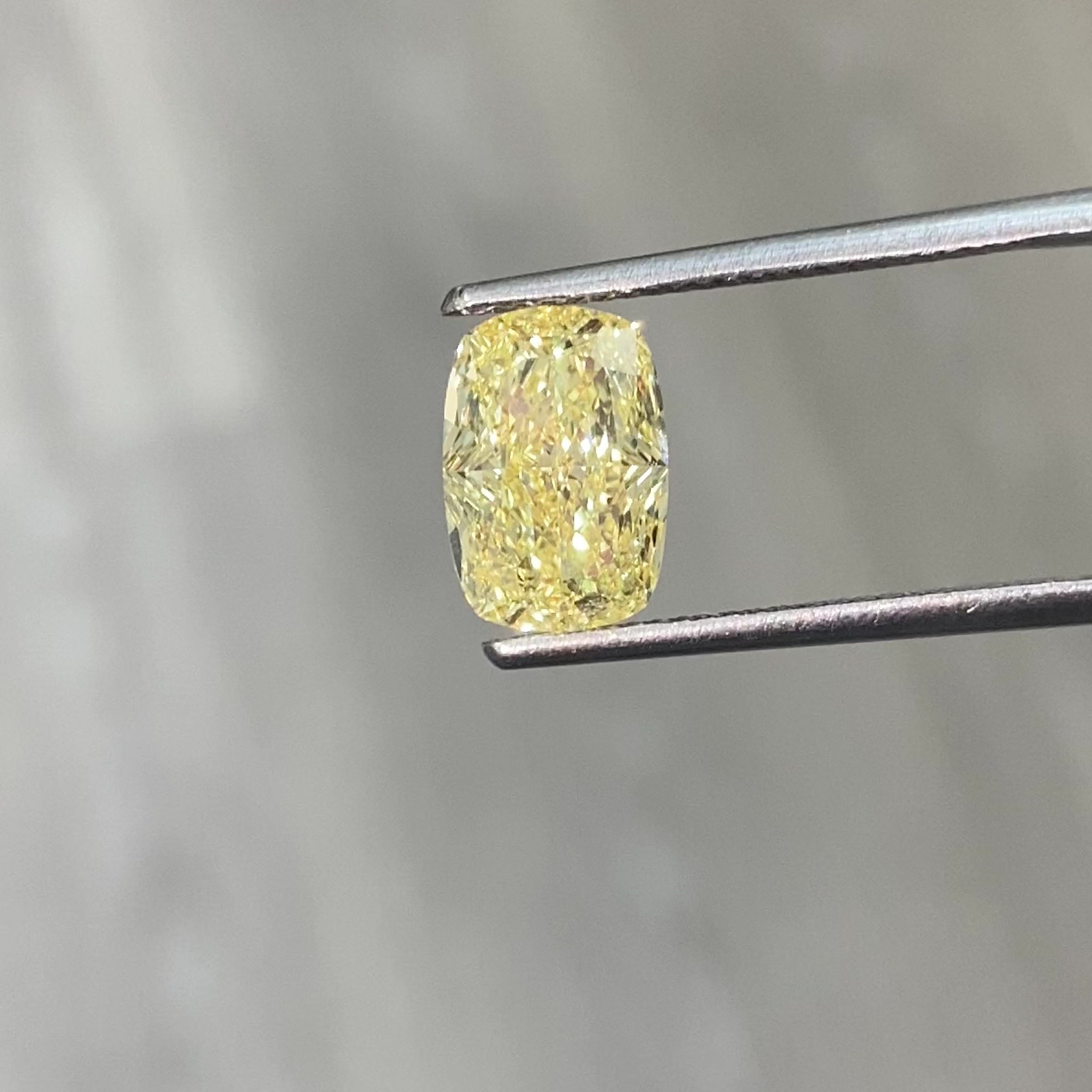 3 carat fancy yellow elongated cushion diamond. 3 carat long cushion fancy yellow diamond.