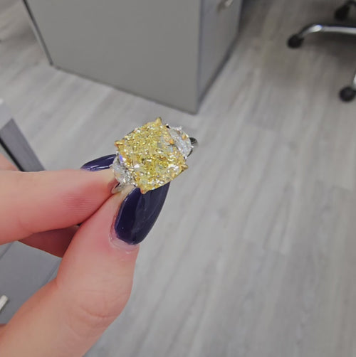 4.02 Carat Cushion Diamond Fancy Yellow Diamond SI1 Clarity  Excellent, Very Good Cutting, No Fluorescence  4.43 Carat Total 0.41 Carat Half Moons Handmade in Platinum & 18k White Gold  GIA Certified Diamond