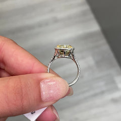 4.73 Carat Center Diamond GIA Light Yellow VS2 Clarity  Cushion Cut Diamond  0.52 Carats of White Rounds  Set in Platinum and 18k Gold  Split Shank band  Handmade in NYC GIA Certified Diamond 