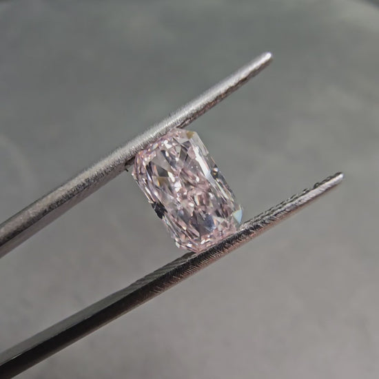 1.59 Carat Fancy Light Orangy Pink Diamond Elongated Radiant Cut Diamond SI2 Clarity Excellent + Excellent Cutting No Fluorescence GIA Certified Diamond
