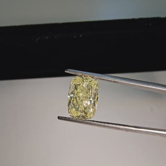 3 carat fancy light yellow elongated cushion cut. elongated yellow diamond cushion.