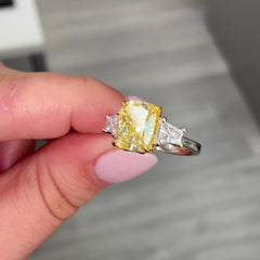 Yellow diamond three stone ring, diamond engagement ring with white trapezoid side stones