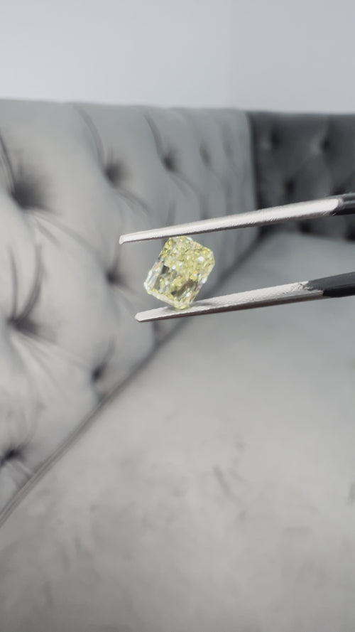 Elongated fancy intense yellow diamond radiant cut. Long yellow diamond radiant cut. Long radiant diamond.