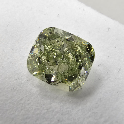 Yellowish green cushion cut diamond, GIA certified.