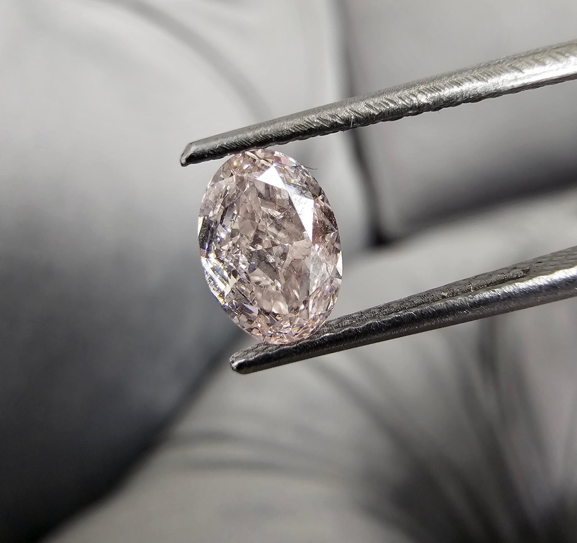 1.01 Carat Oval Cut Diamond Fancy Light Pink  SI1 Clarity  GIA Certified Diamond  Very Good + Good Cutting Medium Orange Fluorescence 