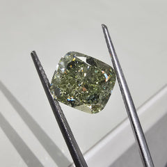 Yellowish green cushion cut diamond, GIA certified.