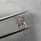 1.59 Carat Fancy Light Orangy Pink Diamond Elongated Radiant Cut Diamond SI2 Clarity Excellent + Excellent Cutting No Fluorescence GIA Certified Diamond