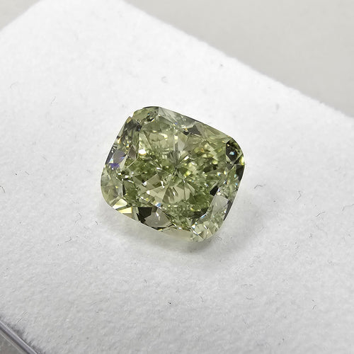 Yellowish green cushion cut diamond, GIA certified.